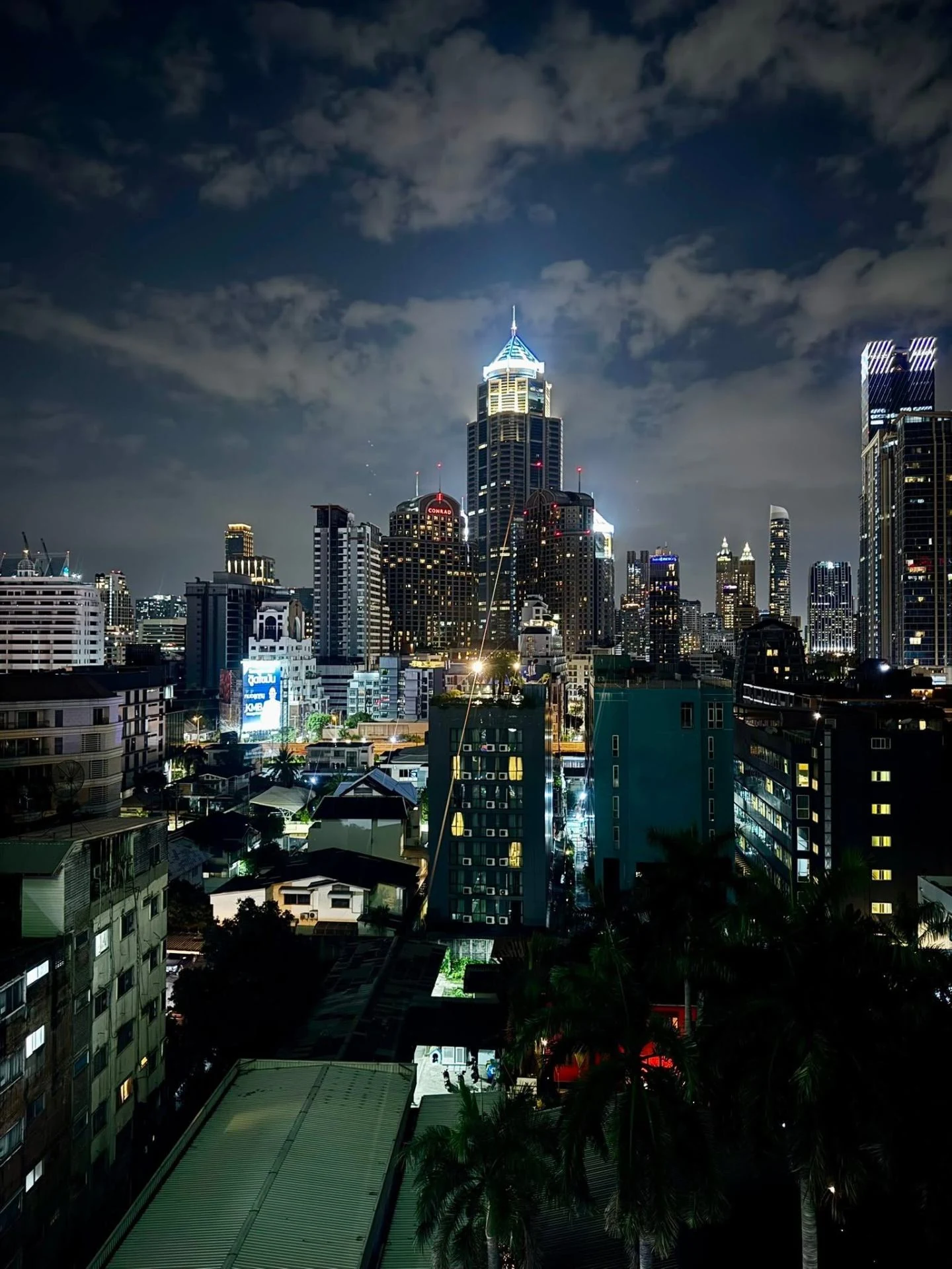 Bangkok city skyline at night with illuminated towers